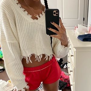 white cropped fringed sweater